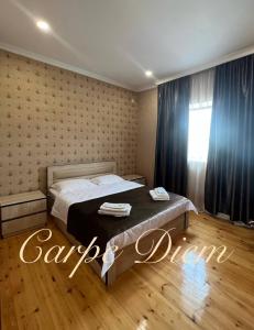 Postel nebo postele na pokoji v ubytování Carpe Diem Signagi