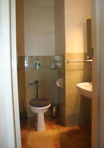 a bathroom with a toilet and a sink at U PRIVATE STUDIO apartment in Gardens Centre in Cape Town +12 photos