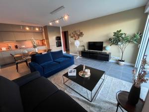 Χώρος καθιστικού στο Appartement neuf avec jardin et parking dans résidence calme