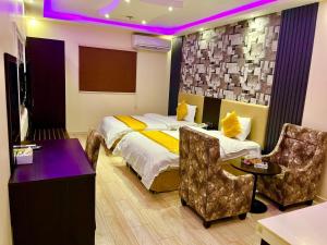 Χώρος καθιστικού στο Nourth House ApartHotel-شقق البيت الشمالي للشقق المفروشة