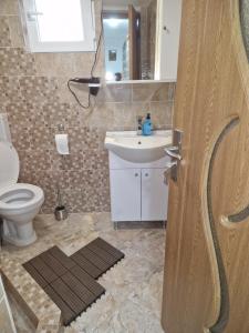 Koupelna v ubytování Casa Marinela + 13 fotografií