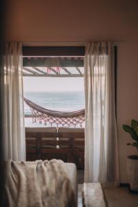Χώρος καθιστικού στο Abacate Casa do Mar
