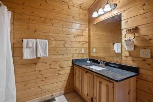 a bathroom with a sink and a mirror at Amazing Grace #264 in Pigeon Forge +22 photos