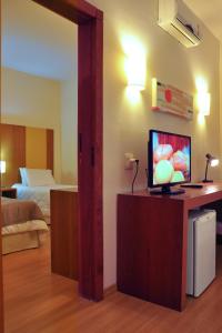 Postel nebo postele na pokoji v ubytování Cegil Hotel Boulevard