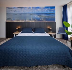 Postel nebo postele na pokoji v ubytování Hotel 't Gemeentehuis