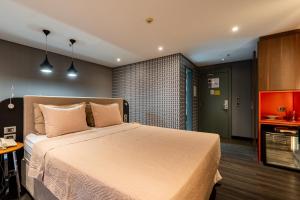 Postel nebo postele na pokoji v ubytování Suíte Grand Luxo Brasília