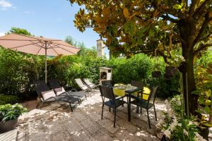Κήπος έξω από το Appartamento villatorretta24 +50 φωτογραφίες