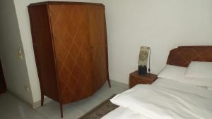 A bed or beds in a room at Nile House
