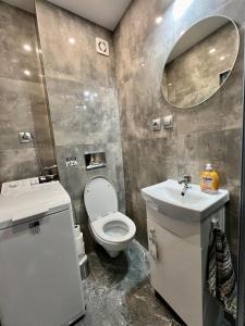 Ένα μπάνιο στο Apartament Centrum Piotra Skargi Słupsk +4 φωτογραφίες