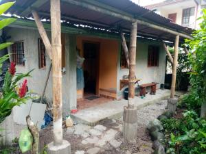 an outside view of a house at Casita in Mindo village, Ecuador in Mindo