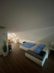 a bedroom with two beds in a room at Pohorsko-chata in Pohorsko
