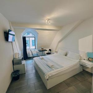 Ένα ή περισσότερα κρεβάτια σε δωμάτιο στο City center room next to Main station