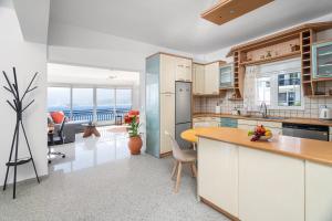 Kuchyň nebo kuchyňský kout v ubytování Ocean Apartment