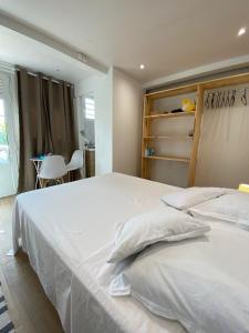 En eller flere senge i et værelse på Studio pistache 2 personnes