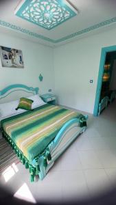 Postel nebo postele na pokoji v ubytování Hôtel Etoile de Mer