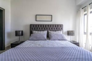 Ένα ή περισσότερα κρεβάτια σε δωμάτιο στο Dream Rooftop Downtown View