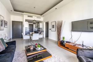 Μια τηλεόραση ή/και κέντρο ψυχαγωγίας στο Dream Rooftop Downtown View