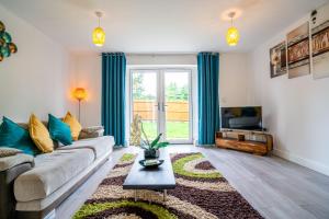 TV i/ili multimedijalni sistem u objektu Mulberry Garden