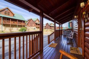 a view from the balcony of a log cabin at Whispering Creek #302 in Pigeon Forge
