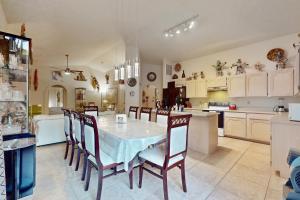 a kitchen and dining room with a table and chairs at Southwestern Sun Sanctuary in Sedona