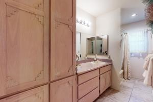 a bathroom with a sink and a mirror at Southwestern Sun Sanctuary in Sedona +16 photos