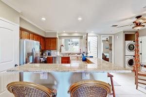 Η κουζίνα ή μικρή κουζίνα στο The Golf Villas at Mauna Lani E3