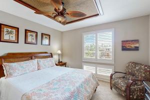 Ένα ή περισσότερα κρεβάτια σε δωμάτιο στο The Golf Villas at Mauna Lani E3 +28 φωτογραφίες