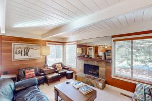a living room with a couch and a fireplace at Sun Valley Escape in Sun Valley