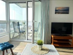 Μια τηλεόραση ή/και κέντρο ψυχαγωγίας στο Frische-Brise-FeWo-15-03