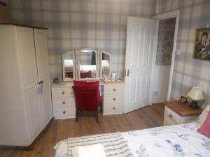 Letto o letti in una camera di Blackbrink cottage