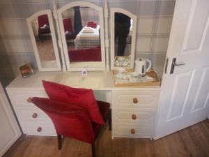 Letto o letti in una camera di Blackbrink cottage