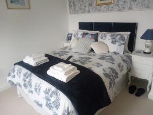 Letto o letti in una camera di Blackbrink cottage