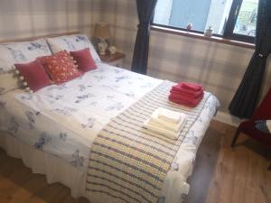 Letto o letti in una camera di Blackbrink cottage