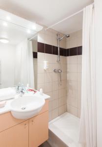 Koupelna v ubytování Aparthotel Adagio Access Saint Louis Bâle