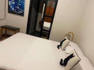 Postel nebo postele na pokoji v ubytování Hostal Patio del Río