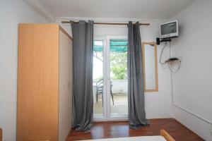 TV a/nebo společenská místnost v ubytování Apartment Vidalici 6519c