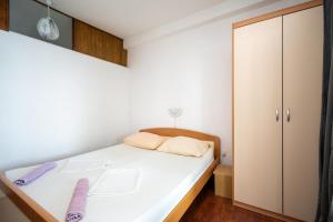 Postel nebo postele na pokoji v ubytování Apartment Vidalici 6519c