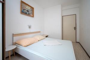 Postel nebo postele na pokoji v ubytování Apartment Vidalici 6519c