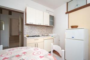 Kuchyň nebo kuchyňský kout v ubytování Apartment Vidalici 6519c