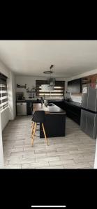 Η κουζίνα ή μικρή κουζίνα στο Loft spacieux et agréable près des châteaux