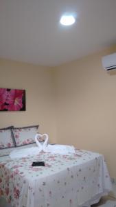 Postel nebo postele na pokoji v ubytování Chalé Alto Mar Flats