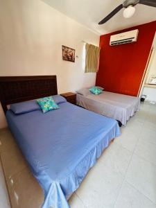Postel nebo postele na pokoji v ubytování Babymar departamentos a 2 cuadras de la playa.