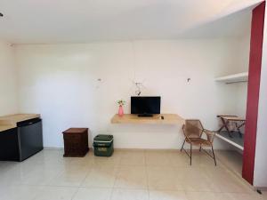 TV a/nebo společenská místnost v ubytování Babymar departamentos a 2 cuadras de la playa.