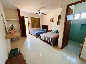 Postel nebo postele na pokoji v ubytování Babymar departamentos a 2 cuadras de la playa. + 31 fotografií