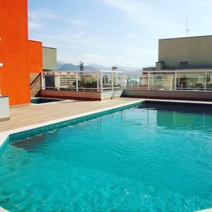 Bazén v ubytování Apartamento Ubatuba, Itagua, Condominio Edificio Villa Monreale, E-12 nebo v jeho okolí