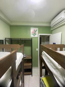 Postel nebo postele na pokoji v ubytování Apartamento Ubatuba, Itagua, Condominio Edificio Villa Monreale, E-12 + 15 fotografií