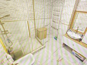 a bathroom with a sink and a mirror at Luxury villa with sea view 1min to beach in Varna City