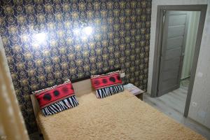 Een bed of bedden in een kamer bij Apartment Decebal