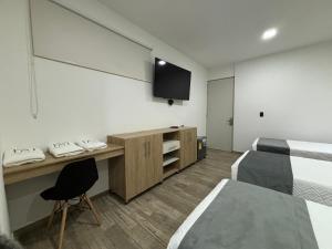 TV a/nebo společenská místnost v ubytování M A Hotel