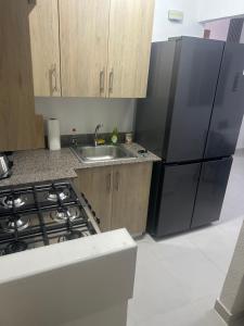 Kuchyň nebo kuchyňský kout v ubytování La Casita de Jayden